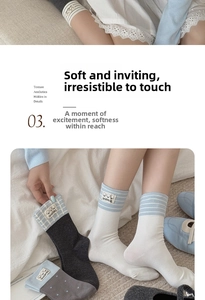 Detail of cotton crew socks with handmade woven labels and blue striped patterns