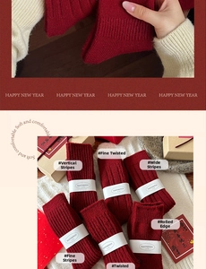 Detail of red festive wool socks with various knit textures and holiday packaging