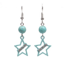 Detail of star-shaped earrings with turquoise beads and inlaid sparkling rhinestones
