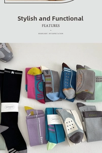 Flat lay view showing colorful athletic compression socks with stripes and star patterns