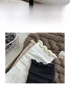 Detail shot of cotton ruffle crew socks in neutral tones with fine knit texture