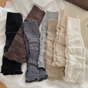 Y2K cable knit leg warmers in multiple colors with ribbed cuffs and lettuce edges
