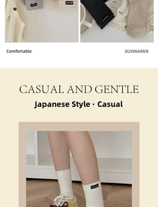 Close-up of casual cotton knit crew socks with fabric labels in various neutral tones