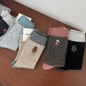 Winter thermal wool socks with cute Christmas embroidery in five classic vintage colors