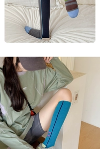 Close-up of ribbed cuffs and elastic knit texture on high-tube athletic sports socks