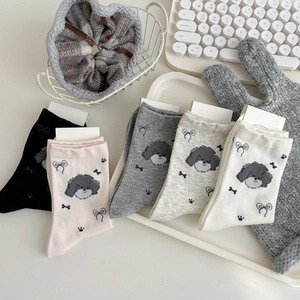 Five pairs of cute cartoon poodle cotton crew socks in assorted pastel and neutral colors