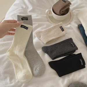 Multipack of ribbed cotton crew socks in neutral tones with minimalist woven side labels
