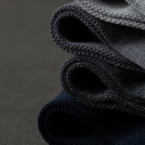 Three-pack men's anti-odor mesh sports socks in navy blue, charcoal, and light grey