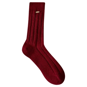Minimalist burgundy wool blend crew socks with ribbed texture and metal plate tag
