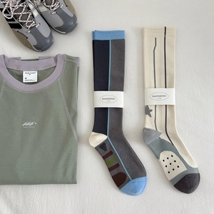 Women's compression sports socks with geometric patterns for running and fitness