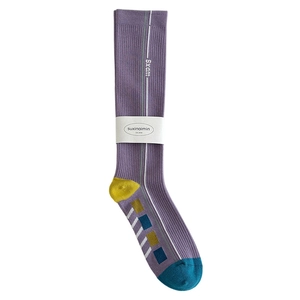 Knee-high compression sports socks in purple and yellow color blocking with stripe details