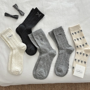 Five pairs of Japanese style cable knit mid-calf socks with floral embroidery and bows