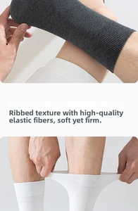 Elastic ribbed cuff detail of men's crew socks showing flexible stretch and soft texture
