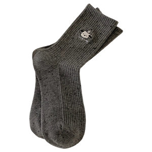 Dark grey speckled mid-calf socks featuring cute embroidered dog and ribbed texture