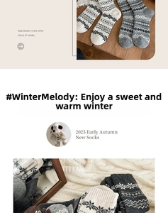 Detail of wool socks with Fair Isle snowflake patterns on a rustic wooden background