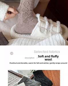 Detail of wool knit socks showing thick cable knit texture and warm autumnal colors