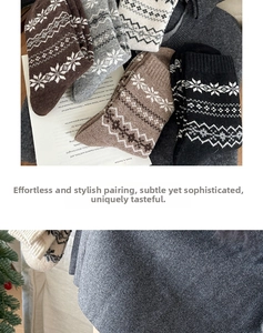 Detailed knit texture of vintage Fair Isle wool socks in various winter neutral colors