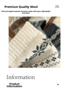 Close-up of thick knitted wool socks with vintage Fair Isle snowflake patterns in cream and grey