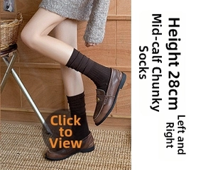 Detail of dark brown slouch socks with ribbed texture and 28cm height measurement