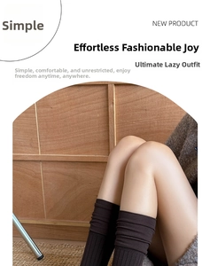 Close-up of dark brown ribbed knit ballet style socks with textured vertical patterns