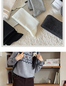 Detail of assorted ribbed knee-high socks in neutral tones and vintage knit cardigan