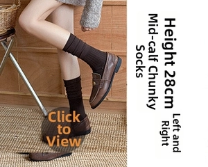 Detailed view of brown slouch socks with vertical stripes, 28cm height shown with shoes
