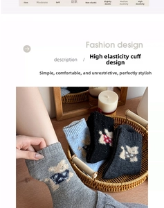 Detail of wool knit mid-calf socks showing plush cartoon dog and high elastic cuff design