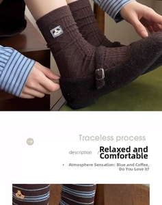 Detail of winter knit socks featuring diamond pattern and cute animal embroidery