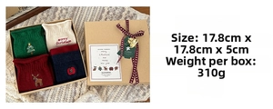 Christmas socks gift box with four pairs of colorful cotton mid-calf socks and red ribbon