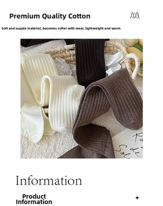 Close-up of ballet style ribbed cotton socks in white brown and black stacked in basket