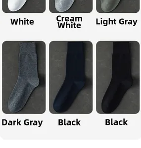 Detail display of cotton crew socks in white, cream, light grey, dark grey, and black colors