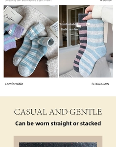 Close-up of thick striped wool knit socks in pink and blue for warm winter comfort