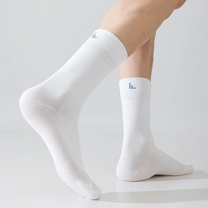 White cotton ribbed crew socks for men with a small navy blue embroidered brand logo