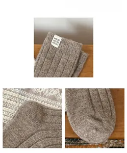 Macro detail of oatmeal wool ribbed mid-length socks with decorative fabric label