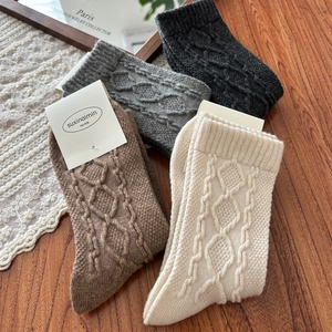 Japanese style wool blend socks with cable knit patterns in four vintage autumn colors