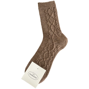 Cozy dark coffee cable-knit wool socks for women featuring vintage textured patterns