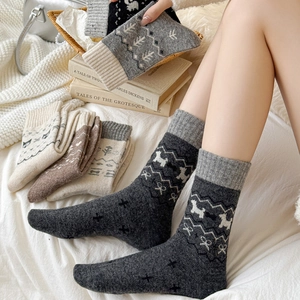 Fair Isle pattern wool socks for women with Nordic dog and tree motifs for autumn winter