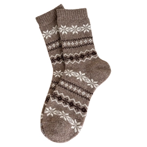 Thick wool socks for women with Nordic Fair Isle snowflake patterns in deep camel color
