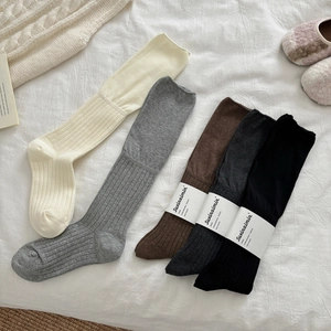 Vertical ribbed knit ballet style over-the-knee socks in five soft neutral colors