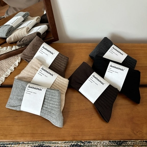 Maillard style solid color knee-high ribbed knit socks in multiple neutral earth tones
