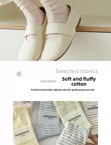 Detailed view of children's striped cotton socks with soft texture and vibrant colors