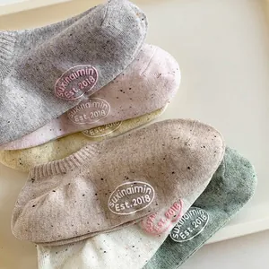 Set of pastel cotton low-cut socks with colorful flecked knit and custom embroidery