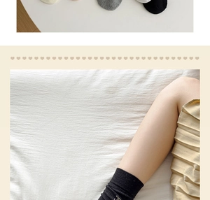 Close-up of ballet style ribbed mesh socks with bow detail in various neutral colors