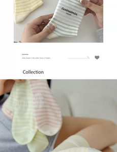 Detail of cream striped crew socks in pastel blue, yellow, and pink cotton knit fabric