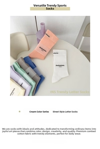 Detailed macro view of seven pastel-colored crew socks made from premium combed cotton