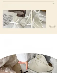Detail view of cream white JK style socks featuring sweet ribbon bows and ribbed cotton texture