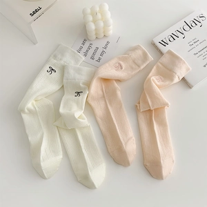 Sweet ballet style hollow mesh crew socks with bow embroidery in white and pink
