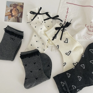 Lace cotton mid-calf socks with bow accents and polka dot patterns for women