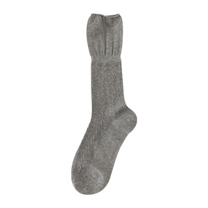 Grey cable-knit mid-calf socks featuring elegant ruffled cuffs and a textured knit pattern