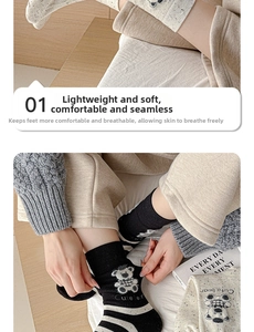 Detail of cute bear embroidery and striped pattern on soft knit crew socks